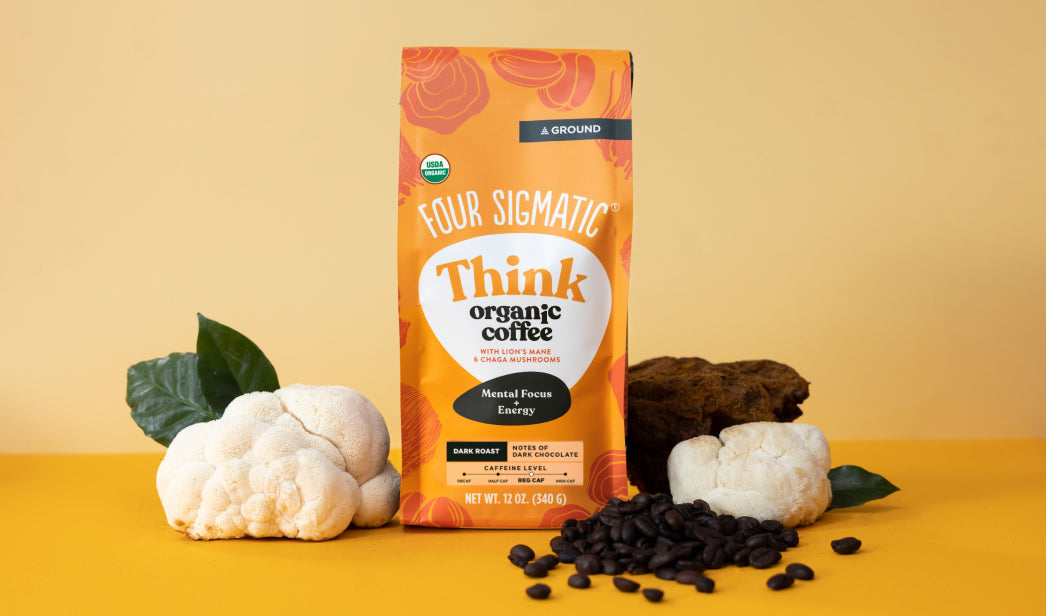Bags of Four Sigmatic Happy Gut organic coffee with gut-brain support.
