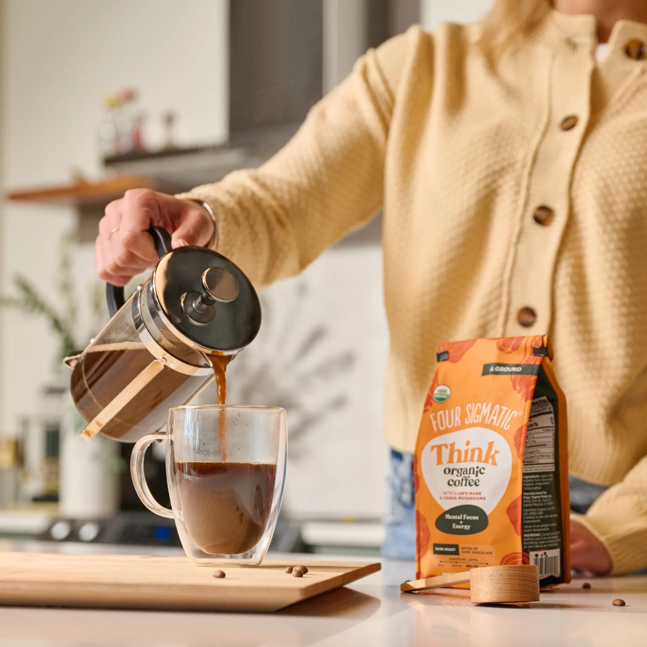 Bags of Four Sigmatic Happy Gut organic coffee with gut-brain support.
