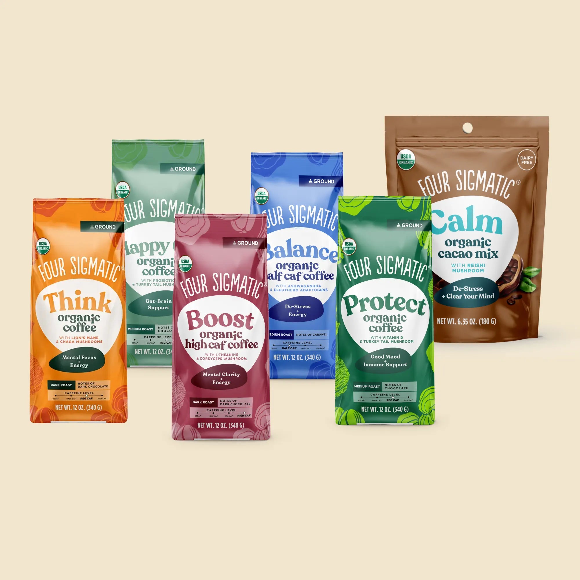 Four Sigmatic products: organic protein, coffee, and cacao mix packages.